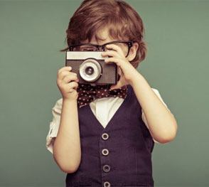 Photography 101 (boy with camera)